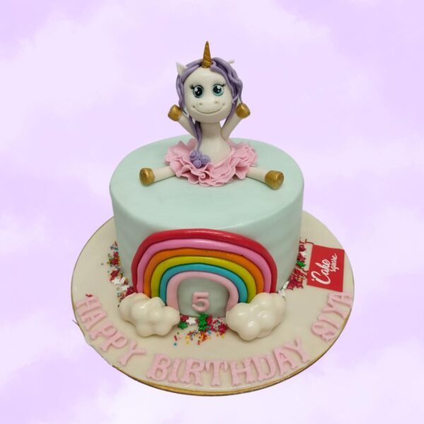 Ultimate Unicorn Girl 1 Kg Birthday Cake Single-tier iridescent cake with unicorn face, gold horn, and pastel rosettes