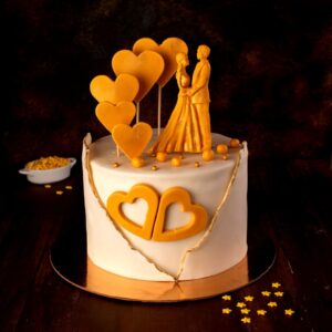 White and gold the royal look of couple and a stylish wrap around design in Ultra Modern Love 1 Kg Anniversary Cake by Cake Square team.