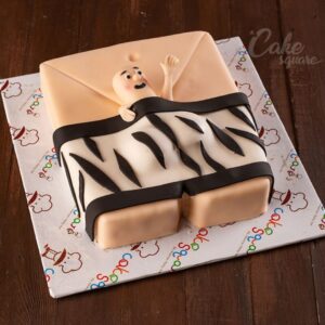 An Undercover Bachelorette Party Cake, featuring a clever and playful design, elegantly displayed on a decorated table, ready to enhance the bachelorette celebration with fun and excitement.