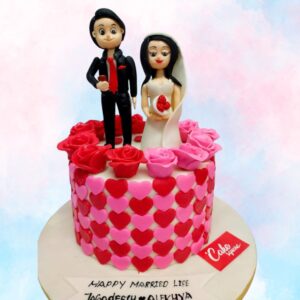 Couple on a cake thats beautiful and made with chocolate and butterscotch flavour is our Wedding Couple 3 Kg Anniversary Cake By Cake Square Team