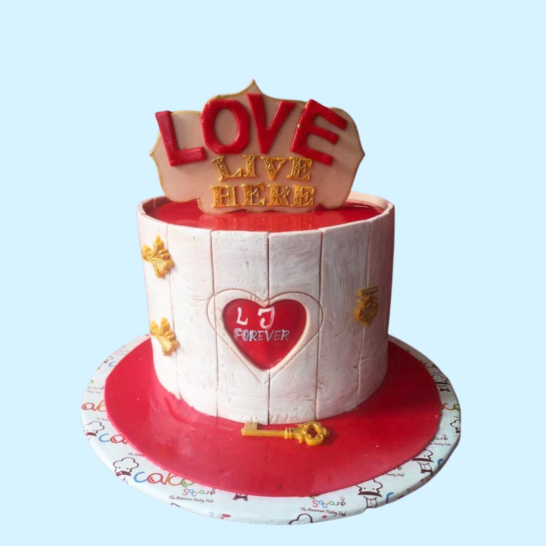 Love is the word on the top, nothing but love is Love Sign 1 Kg Anniversary Cake by Cake Square team.