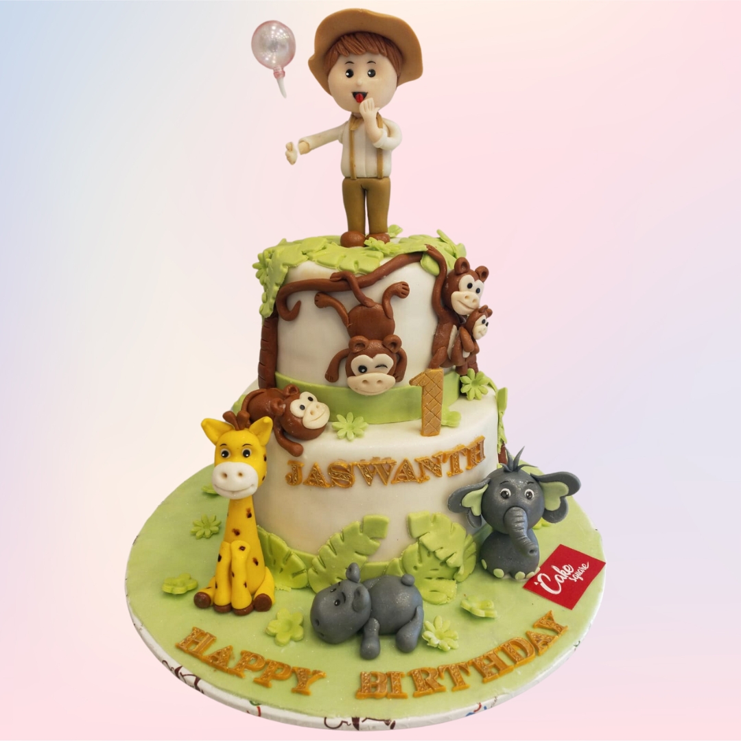 Amazing Animals Boys First Birthday Cake 4 Kg with an animal theme, featuring playful animal figures and vibrant decorations, ideal for a fun celebration.