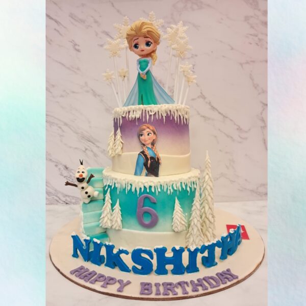 Amazing Frozen Theme First Birthday Cake 5 Kg. Spectacular multi-tiered Frozen-inspired cake with character figurines and icy decorations for a first birthday