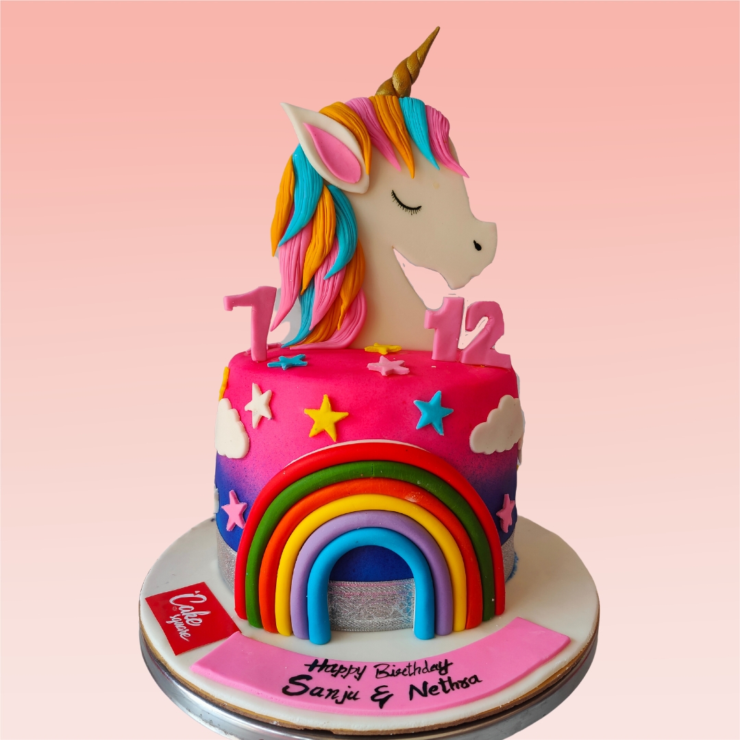 Amazing Happiest Unicorn Birthday Cake 2 Kg. Magical pastel-colored cake with a golden unicorn horn, flowing mane, and rainbow accents