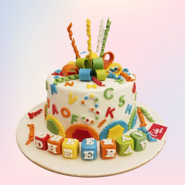 Awesome Alphabets Birthday Cake 2 Kg. Colorful cake decorated with edible alphabet letters and educational motifs