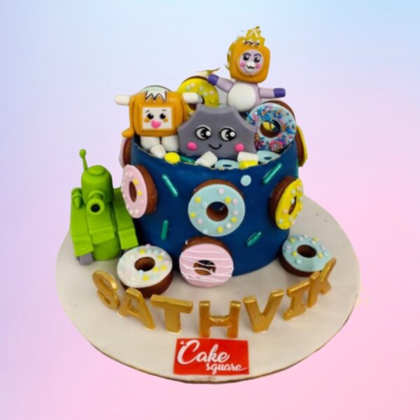 Awesome Donuts Themed Kids Birthday Cake 2 kg. Birthday cake designed to look like a giant stack of colorful donuts