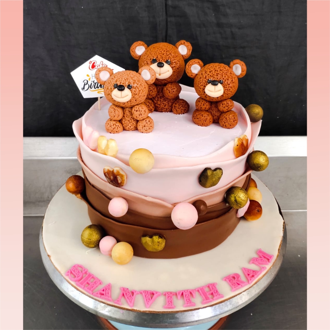 Beautiful Teddy Themed Birthday Cake 2 Kg.Adorable teddy bear-themed birthday cake with cuddly fondant decorations