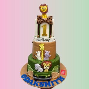 Best Animals Kids First Birthday Cakes 4 Kg with an animal theme, featuring various colorful animal figures and jungle decorations, perfect for a lively celebration.