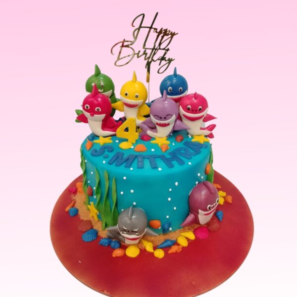 "Best Baby Shark Kids Birthday Cake 1 Kg. Playful 1kg kids' birthday cake with Baby Shark theme and ocean decorations"