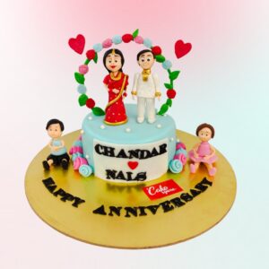 Couple under a flower ring with two children on the side is a perfect family cake made with butterscotch flavour by Cake Square Team