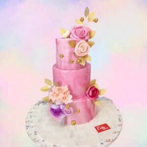 Best Pink Roses Engagement Cake 7 Kg with ivory fondant, adorned with a profusion of handcrafted pink sugar roses and gold leaf accents.