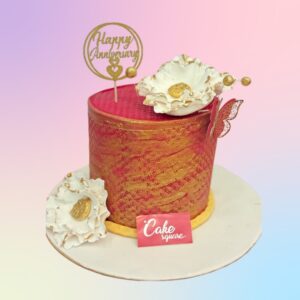 A colourful stylish cake with hand made flowers in Rich chocolate flavour cake by Cake Square Team