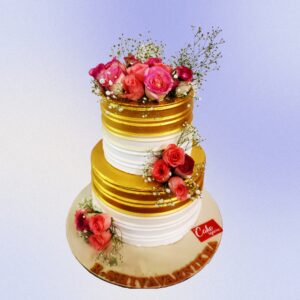 "Creamy Golden 2-Tier 4 Kg Anniversary Cake in butterscotch flavor, elegantly decorated for a sophisticated celebration."