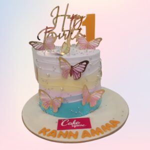 Cute Premium Butterfly Cream Girls Birthday Cake 1 Kg decorated with delicate butterfly designs and creamy frosting, perfect for a cute and premium celebration.