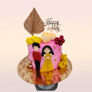 "Cutest Couple Theme 1 Kg Anniversary Cake in pink color with butterscotch flavor, perfect for a romantic celebration."