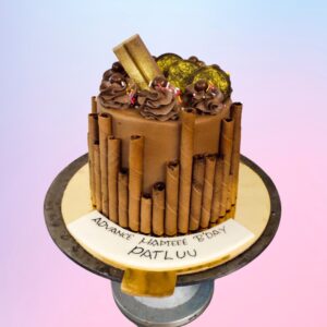 "Exotic Chocolate Birthday Cake 1 Kg. Luxurious 1kg chocolate birthday cake with intricate cocoa decorations"