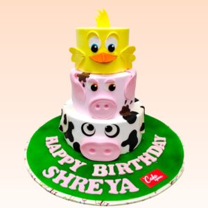 "Fantastic Farm Animals First Birthday Cake 7 Kg. Elaborate 7kg first birthday cake with colorful farm animal decorations"