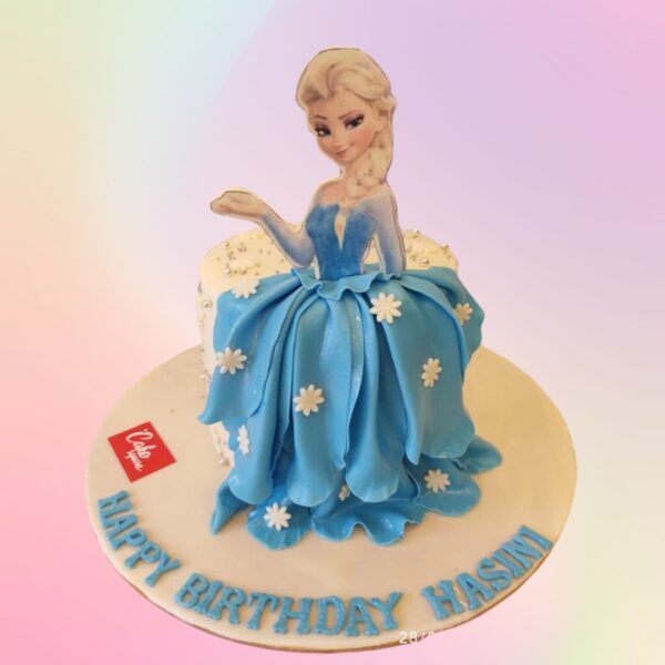 Frozen Theme Girls Birthday Cake 1 Kg. Delightful small cake with Frozen-inspired colors and snowflake designs for a girl's birthday