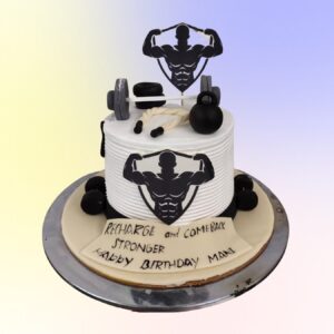 Gym Themed Birthday Cake 1 Kg. Fitness-inspired 1kg birthday cake with miniature dumbbells and protein shake decorations