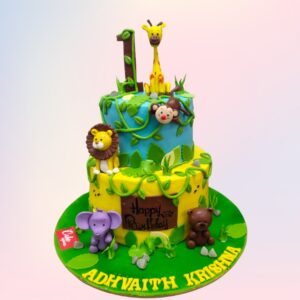 "Jungle Animals First Birthday Cake 4 Kg. Colorful 4kg first birthday cake with adorable jungle animal decorations"