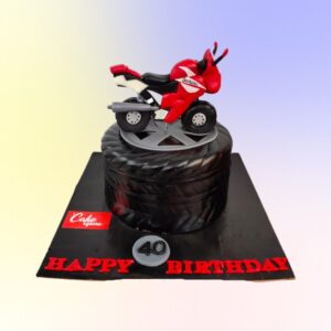 Latest Bike Themed Birthday cake 2Kg. Eye-catching bicycle-themed birthday cake with realistic fondant decorations