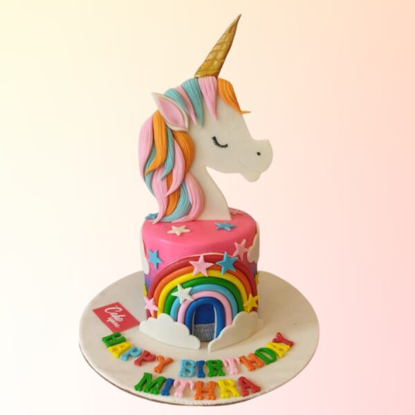 Most Magical Unicorn Girls Birthday Cake 1 Kg. Colorful unicorn-themed birthday cake with pastel frosting, gold accents, and a fondant unicorn topper.