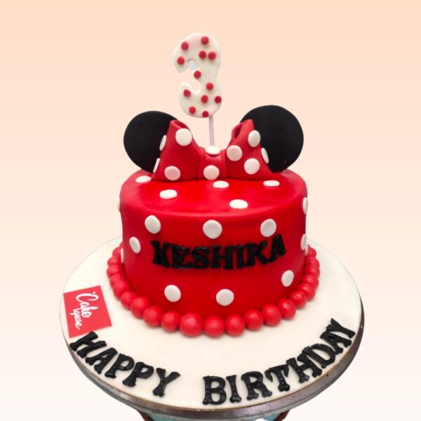 New Minnie Third Birthday Cake 1 Kg. Adorable Minnie Mouse themed cake with pink bow and polka dots for a 3rd birthday celebration.