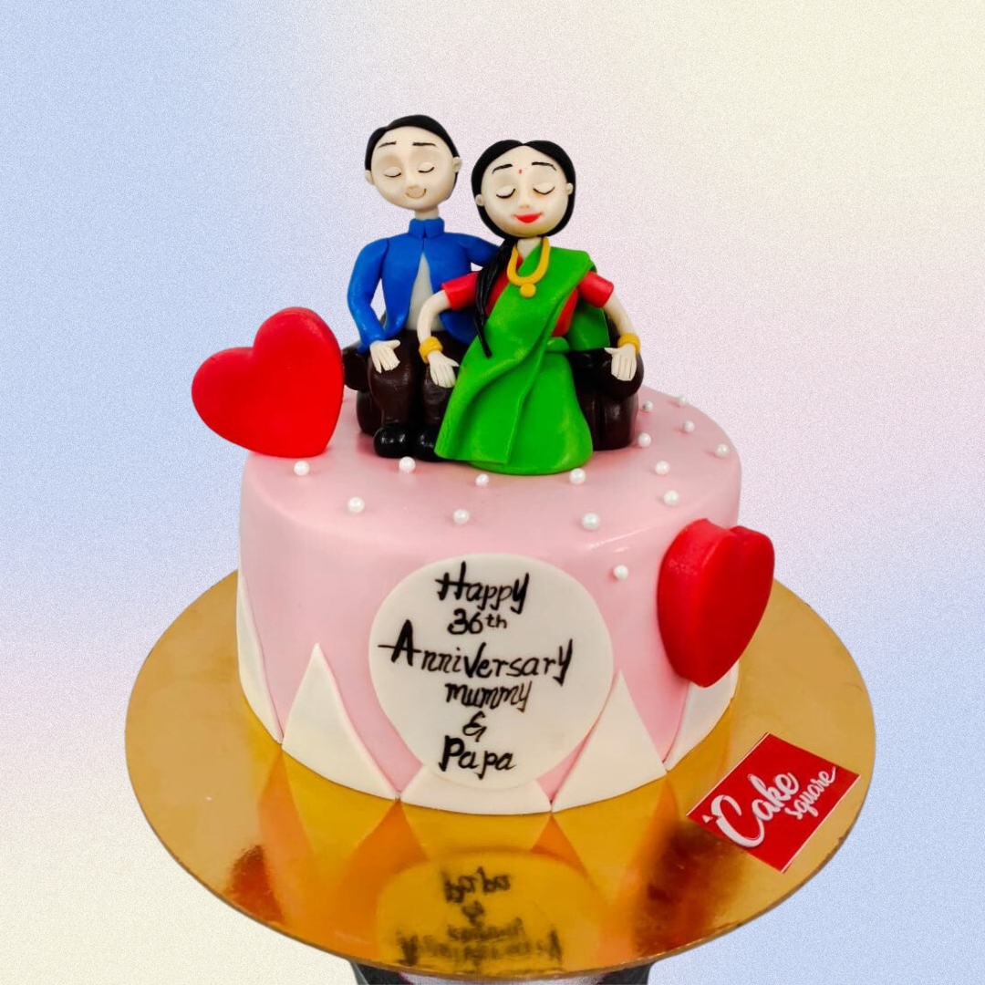 "Parents Anniversary Cake 1 Kg in butterscotch flavor, featuring elegant decorations for a special celebration."