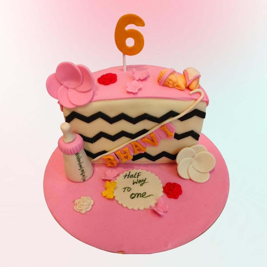 "Pink Theme Girls Half Birthday Cake 1 Kg with delicate pink decorations, perfect for a sweet and stylish half-birthday celebration."