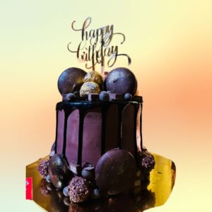 Premium Chocolate Cakes 1 Kg. Decadent 1 kg chocolate cake with rich ganache and elegant chocolate decorations