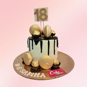 Premium Macaroon Birthday Cake 1 Kg. Luxurious 1kg birthday cake adorned with colorful French macarons