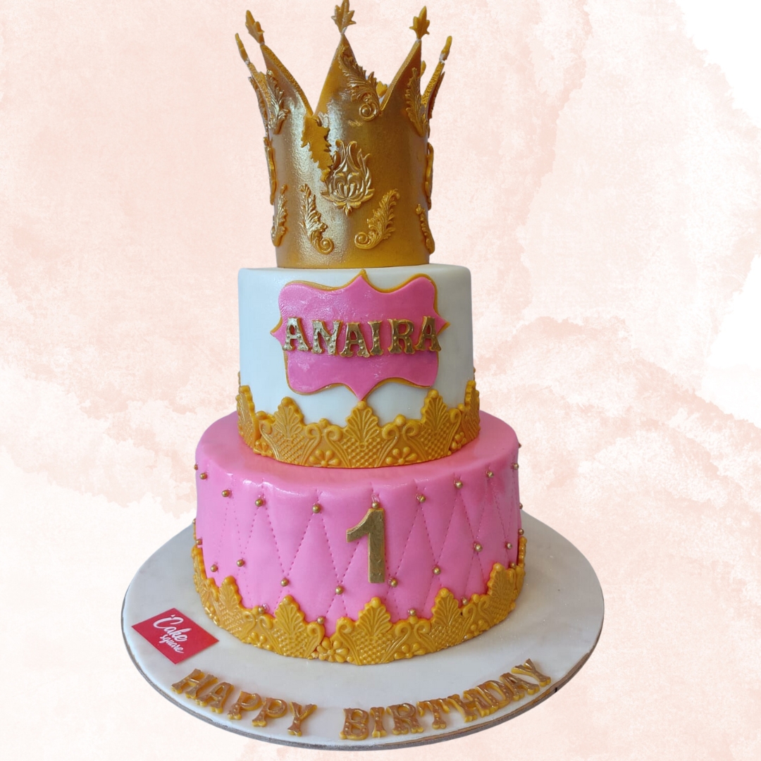 Royal Crown Girls First Birthday Cake 4 Kg featuring a golden crown and elegant decorations, perfect for a regal celebration.