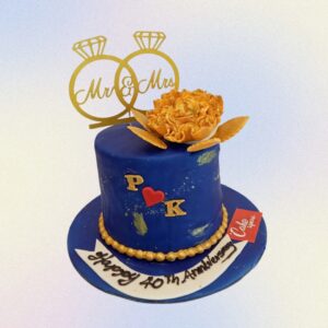 "Royal Mr And Mrs 2 Kg Anniversary Cake in pineapple flavour, featuring a regal design for a sophisticated celebration."