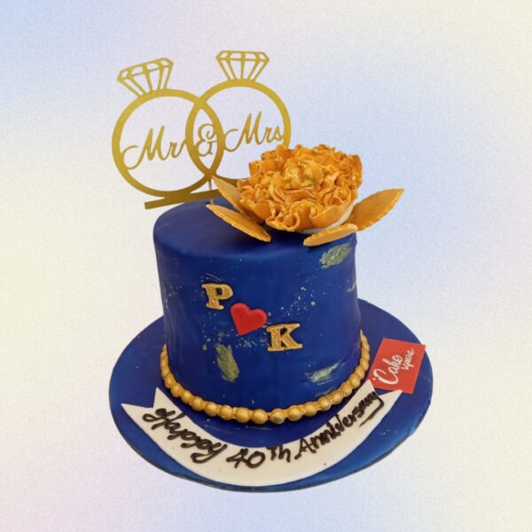 "Royal Mr And Mrs 2 Kg Anniversary Cake in pineapple flavour, featuring a regal design for a sophisticated celebration."