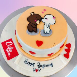 Superb Puppy Couple Engagement Cake 1 Kg. A charming 1 kg engagement cake featuring an adorable puppy couple design, perfect for a fun and whimsical celebration of love.