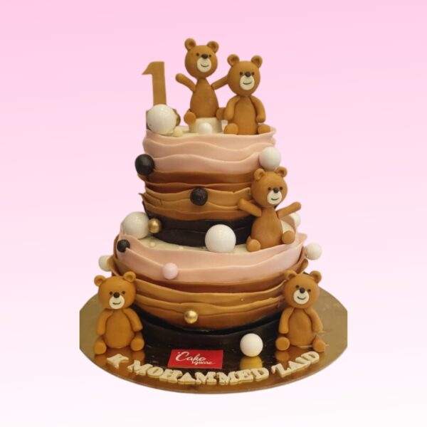 Teddy First Birthday Cake 5 Kg, featuring a charming teddy bear design and elaborate decorations, perfect for a memorable celebration.