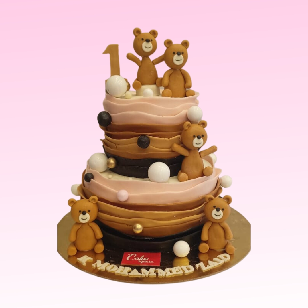 Teddy First Birthday Cake 5 Kg, featuring a charming teddy bear design and elaborate decorations, perfect for a memorable celebration.