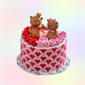 "Teddy Theme 1 Kg Anniversary Cake in red velvet flavor, featuring adorable teddy decorations, perfect for a cute and romantic celebration."