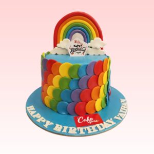 Vibrant Rainbow Theme Birthday Cake 2 Kg. A vibrant rainbow-colored cake, ideal for a colorful and fun birthday celebration.