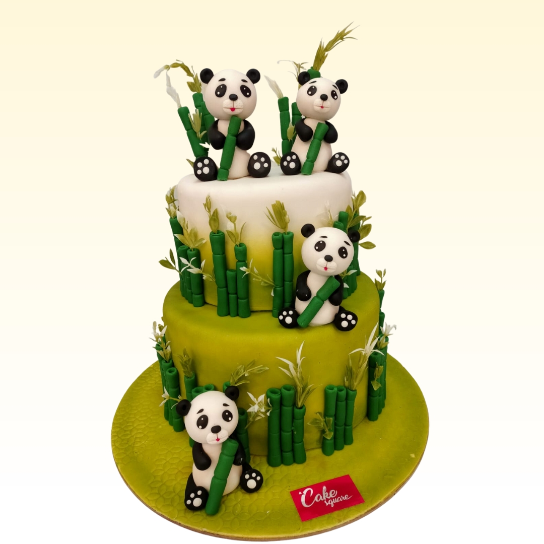 Pandas with girl cake - Animal Theme Cakes - Kukkr India