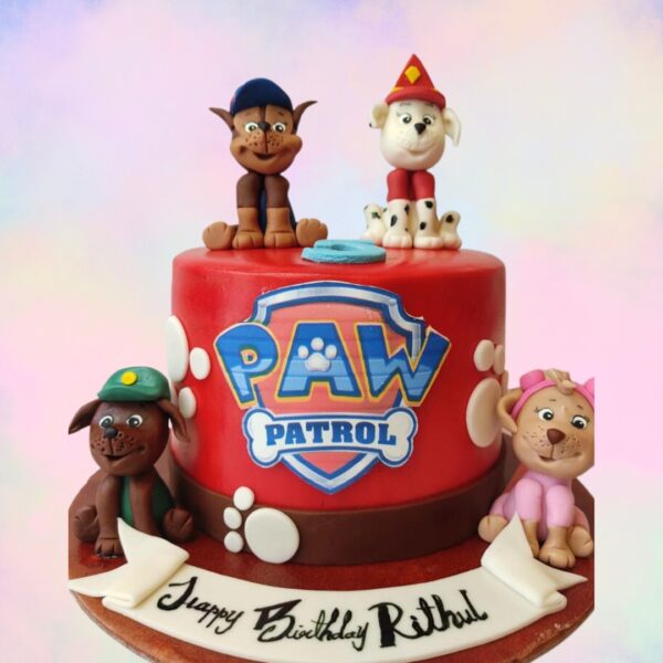 Amazing Paw Patrol Themed Boys Birthday Cake 1 kg. Birthday cake decorated with Paw Patrol characters and rescue vehicles