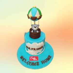 Best Baby Home Coming themed Cake 3 kg. Elegant baby-themed cake with pastel colors and nursery motifs