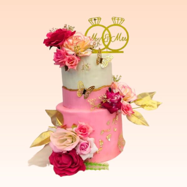 "Flowers Theme 2-Tier Pink Gold Wedding Reception Cake 4 Kg, featuring an elegant floral design with pink and gold accents."