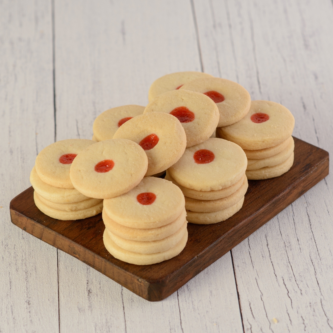 Strawberry Jam Cookies 150 gms. Golden cookies with strawberry jam centers, 150-gram serving.