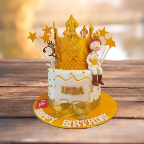 Amazing Prince Theme Kids Birthday cake 2 Kg. Regal 2kg prince-themed birthday cake with crown and castle decorations