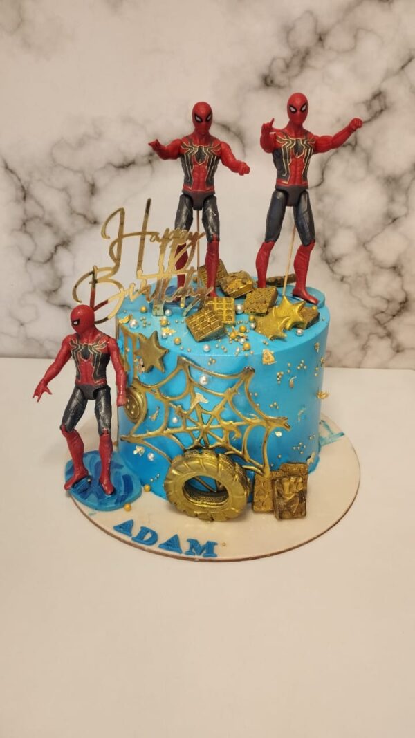 Amazing Spiderman Birthday Cake 2 kg. Vibrant 2kg Spiderman-themed birthday cake with red and blue fondant, web patterns, and Spiderman figure topper