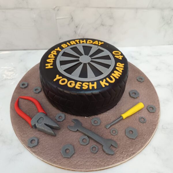 "A Best Chocolate Car Tire Birthday Cake 1 Kg, from Cake Square Chennai, perfect for car enthusiasts."