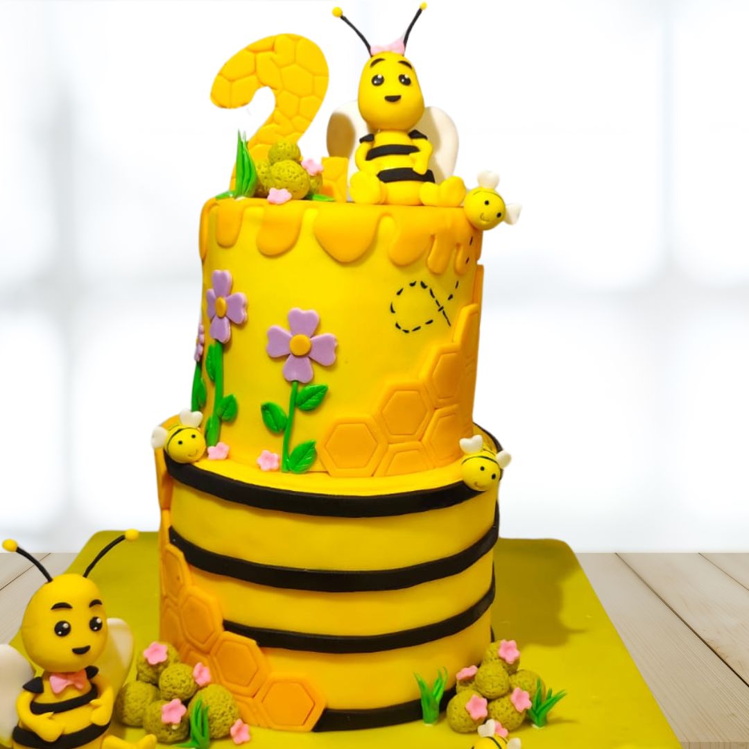 "Bumble Bee Kids First Birthday Cake 4 Kg with vibrant bee decorations, perfect for a cheerful and buzzing first birthday celebration."