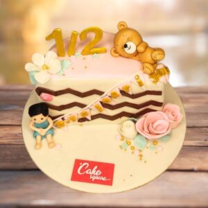 "Cute Teddy Half Birthday Cake 1 Kg featuring adorable teddy bear decorations, perfect for a charming and fun half-birthday celebration."