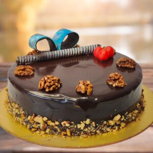 Rich chocolate cake topped with full size walnuts on Dark Chocolate Walnut 1 Kg Birthday cake by Cake Square.